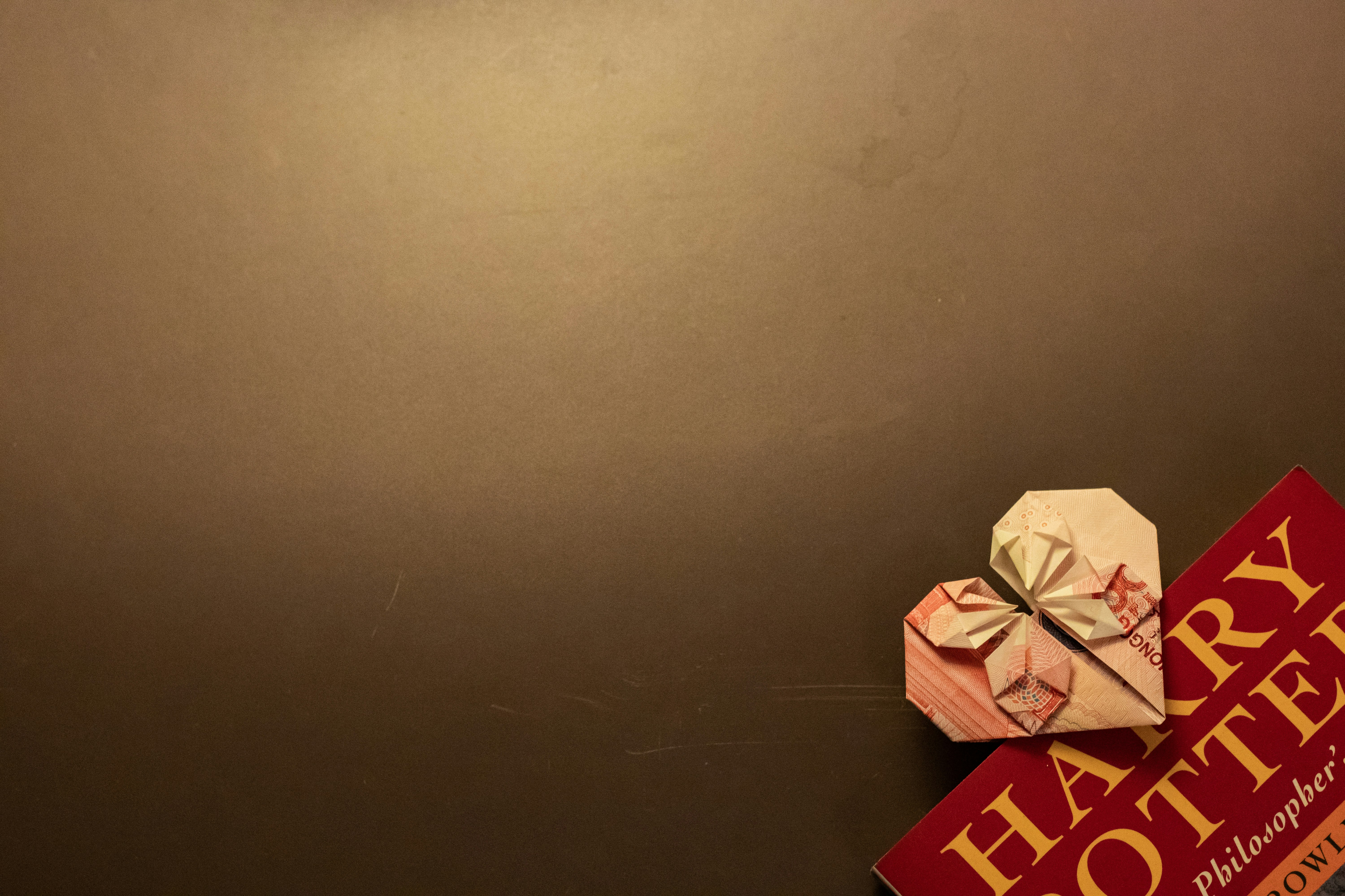 red and white box on black table